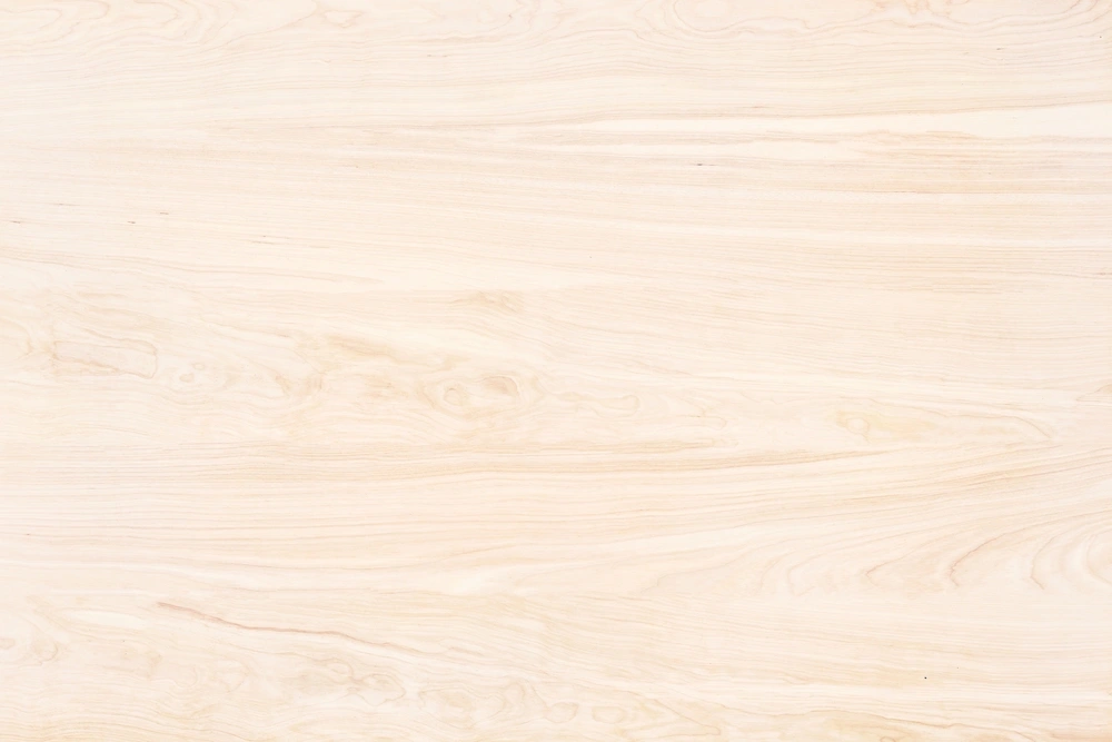 Light natural wood grain texture background.